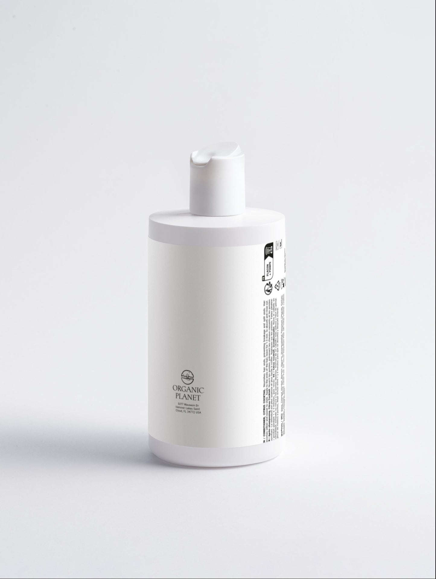White bottle with a pump on a light gray background. This conditioner nourishes and protects hair ends to prevent breakage and split ends. It makes hair smoother, easier to style, and adds volume. Suitable for all hair types, it includes a refreshing Citrus Cocktail.